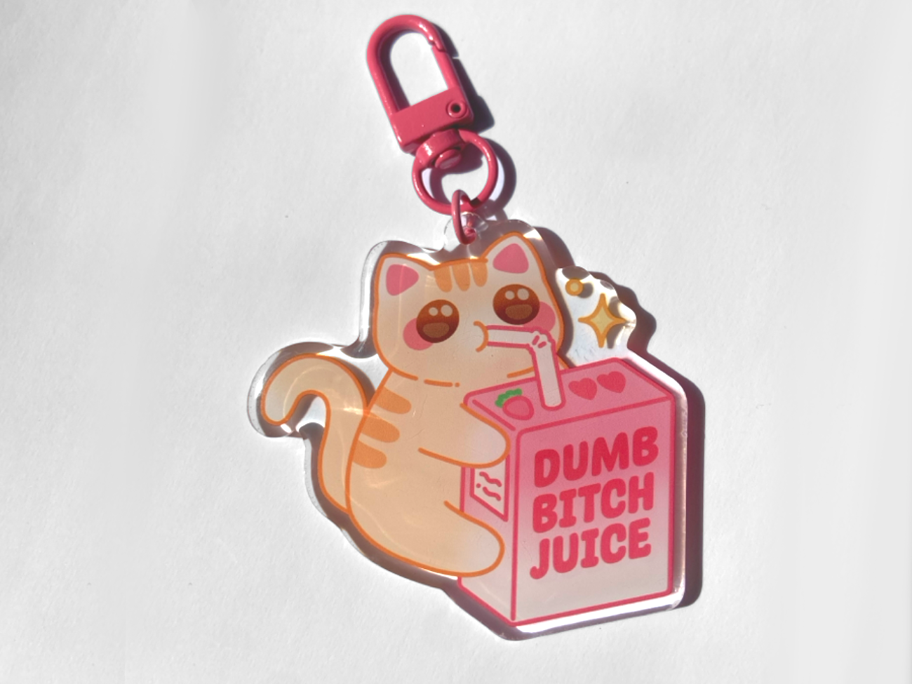 DUMB CAT JUICE KEYCHAIN