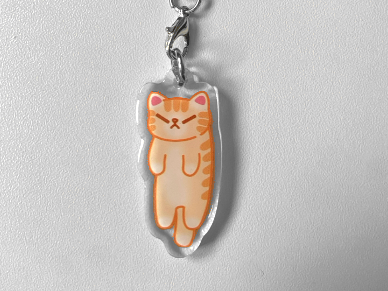 HANGING CAT PHONE CHARM