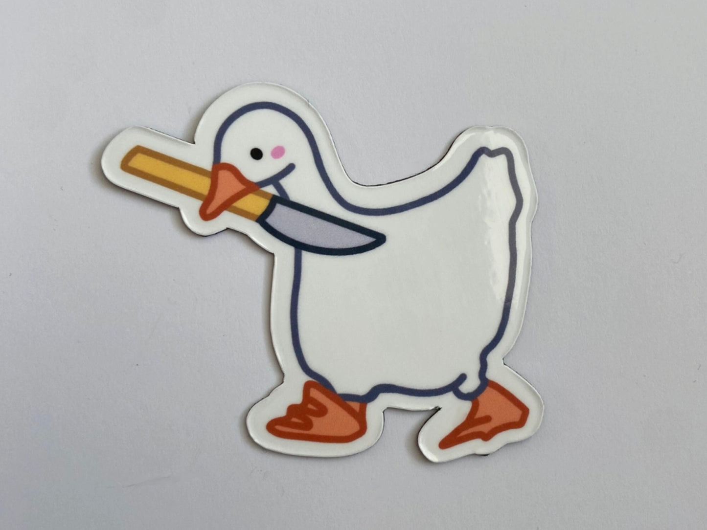 DUCK WITH A KNIFE FRIDGE MAGNET